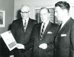 Mayor John Lockhart, former Mayor J. Gordon Blair (holding a cigarette and  a brochure about Progress Park) and Bud Gordon, 1960