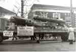 A Victory Bonds parade on Brant Street, displaying an unexploded V1 Robot Bomb, ca 1945