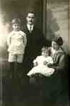 Jim and Ethel (nee Gallagher) Whatmough, with two of their three children, perhaps Maurice and Howard, ca 1918