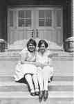 Anne Wood and  Jean Smith on the front steps of Burlington High School, the last day of school, June 29, 1929