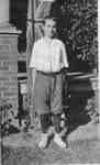 George R. Harris standing outside the Harris home at 513 Locust Street, ca 1915