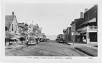 Main Street, Burlington, Ontario, Canada. -- view of street down to lakefront; postmarked July 9, 1952