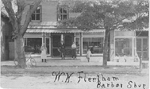 W.N. Fleetham Barber Shop -- Exterior with 4 people in front; dated 1907