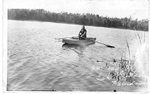 Lake Medad, Waterdown -- Man in rowboat; postmarked May 20, 1940