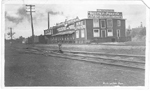 Biggs Fruit and Produce Co. -- Exterior: seen from beyond railway tracks; postmarked Dec 17, 1909