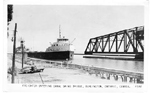 Freighter Entering Canal Swing Bridge, Burlington, Ontario, Canada; postmarked July 9, 1952