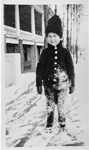 Brant Coleman standing on skates in front of Brant Hotel, winter ca 1915