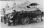 Russell Emery (right) selling melons at the Hamilton Market, 1911