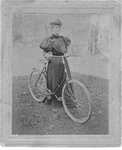 Mrs W. F. W. Fisher with her bicycle, ca 1897