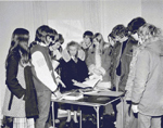Students visiting "Pine Hall", the Van Norman - Breckon House, 955 Century Drive, with BHS member Frances Day, ca  1975