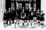 Junior Girls' Basketball team on the front steps of Burlington High School, 1931