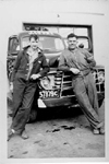 Frank Armstrong and Cam Patterson in front of a J. Cooke Concrete Block Limited truck, ca 1949