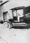 The Nicholson Lumber company delivery truck with Allen S. Nicholson standing at left, ca 1910