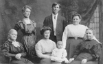 Emery Family -- L-R: Edith Bell, Elizabeth Emery, Pansy (nee Filman) Emery with baby Jean, Russel Emery, Mrs. John Filman, Mrs. Annie Smale