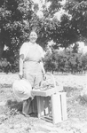 Mann Family -- Mrs. Henry Mann; strawberry-picking at Scheer farm, 1942