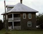 Wood shingle siding, location unknown