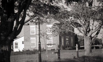 Brick two-storey square, transom; Unknown Location