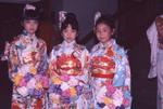 Three girls in Japanese dress