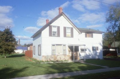 White, 1.5 storey house