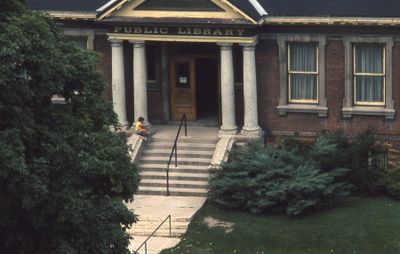 Exterior of Carnegie library, front steps, 1973