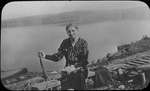 Portrait of a woman seated in front of Rice Lake(?)