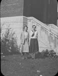 Portrait of two young women in front of Colborne High School