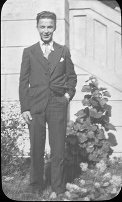 Portrait of Jack Armstrong in front of Colborne High School