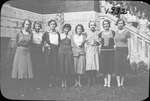 Portrait of a group of young women in front of Colborne High School