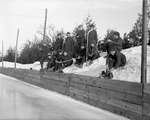 A group of boys at an outdoor hockey ring, Colborne