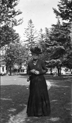 A woman standing in Victoria Square