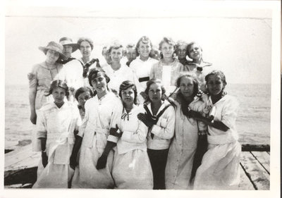 Group photograph of women by the lakeshore