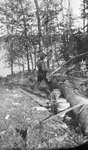 A man sawing wood