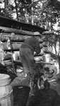 A man washing up at a camp