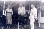 Reproduction photograph of Hattie Edna (nee Black) Kerr, Evelyn (nee Merriman) Huggard, Dr. Roy Huggard and Roy Riddell Huggard