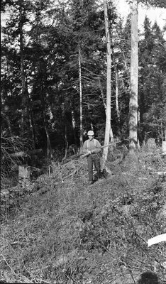 A hunter walking in the woods