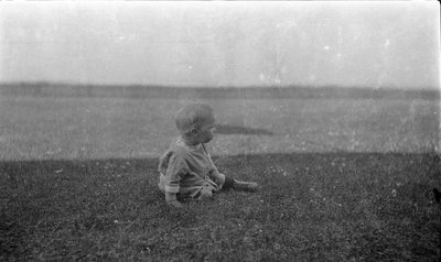 A young boy looking out to Lake Ontario at Griffis' summer house