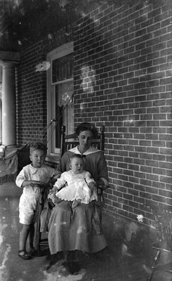 Griffis family photo on the porch of 7 Church St East, Colborne