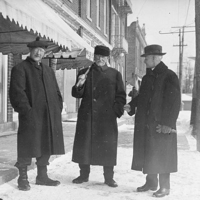 James McGlennon (centre) and two other gentlemen in front of Custom House, Colborne