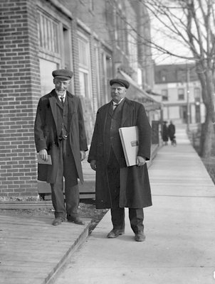 Abraham Gould, town clerk, and Chief Jamieson standing on King St., Colborne