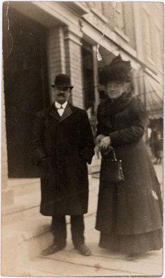 Miss McTavish and an unidentified man