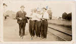 Jno. Snetsniger, Frank Gill, Arthur Hawkins, Clinton Coyle, and Dave Black at train station