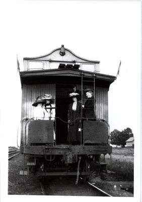 Colborne women modelling Miss Culver’s hats at the Grand Truck Railway Station, Colborne