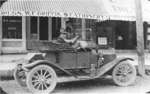 Frank Griffis in front of W. F. Griffis Drug Store, Colborne, Cramahe Township