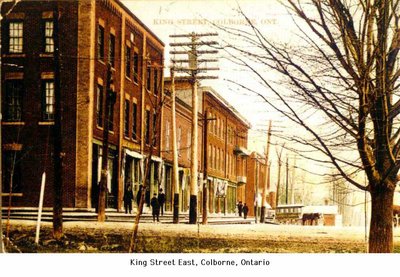 Postcard of King Street East, Colborne - horse drawn coach in background