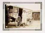 An unidentified woman standing in front of a Rowsome's Bakery horse drawn wagon, Colborne