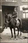 Real photo postcard of WWI soldier on horseback