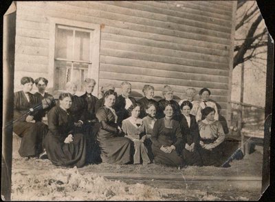 An outdoor group photograph of women including Captain Harry Redfearn’s wife, Abby