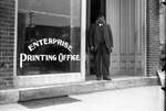 Henry Gale standing outside the Enterprise Printing Office
