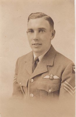 Studio portrait of Flying Officer James McLaughlin, D.F.C., R.C.A.F.