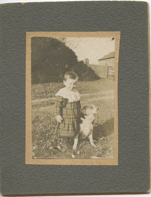 Unidentified boy with his dog